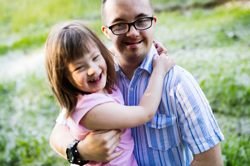 Picture of girl and man with down syndrome
