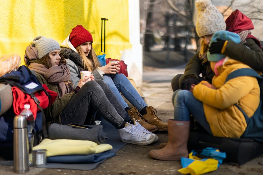 ukrainian-immigrants-crossing-border-and-sitting-and-waiting-for-registration